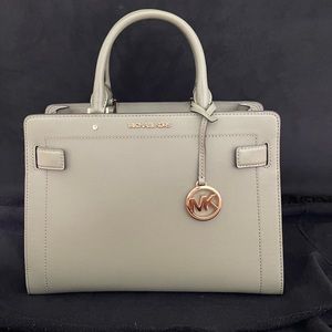 Beautiful Michael Kors purse never used. Smoke free home. No pets.